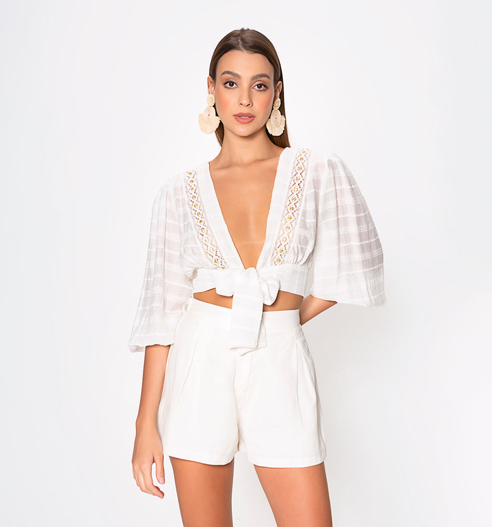 Blusa manga 3/4 con anudado en delantero