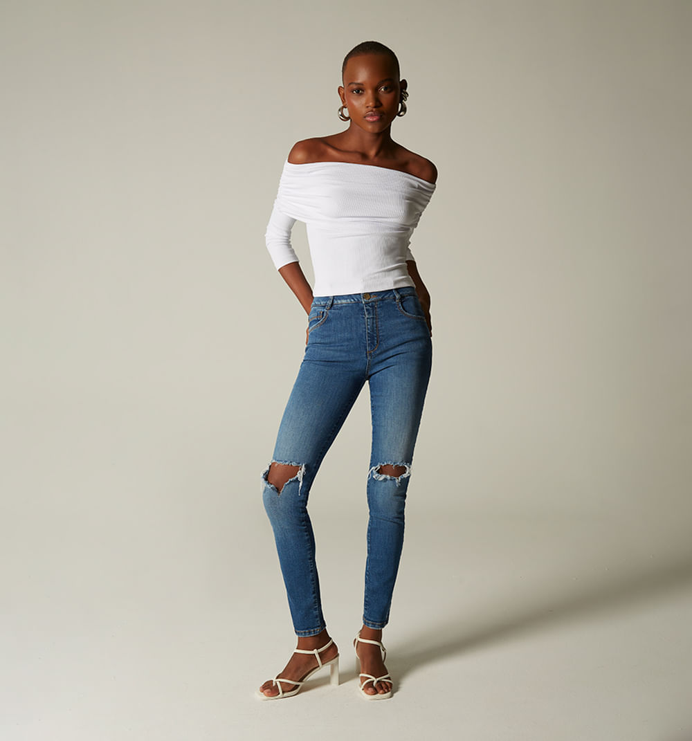 Jean skinny tiro alto, cinco bolsillos, rotos en rodilla
