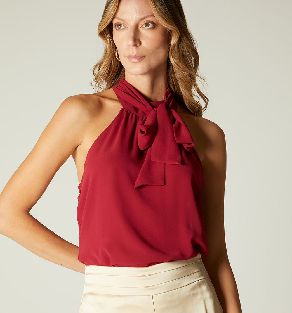 Blusa cuello alto con amarre