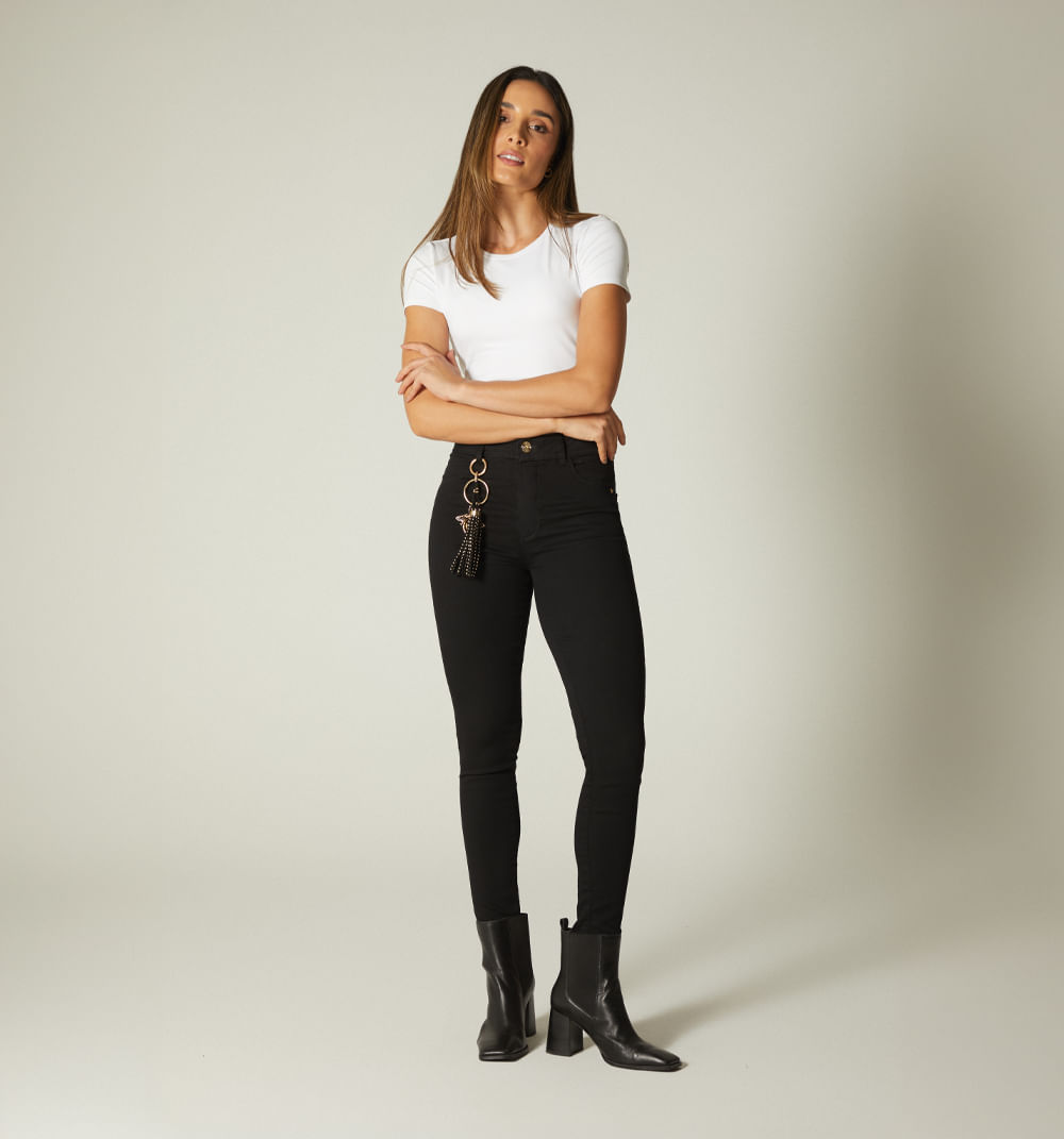 Jean negro skinny tiro alto con borla