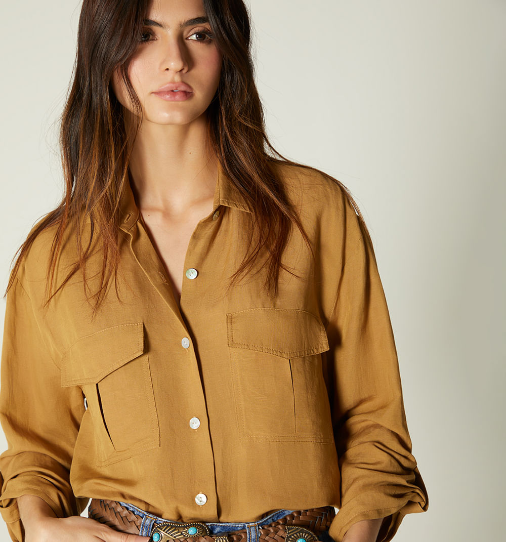 Blusa manga larga  con bolsillo