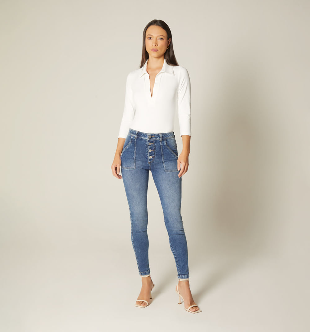 Jean skinny tiro alto bolsillos parche