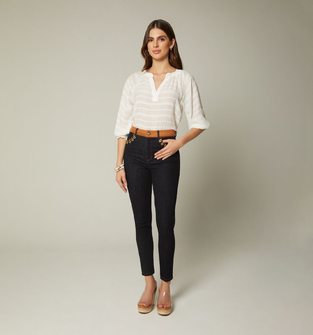 Jean skinny tiro alto ojaletes con suede