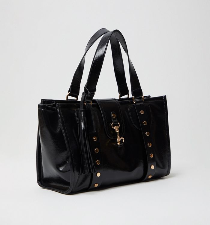 Bolso de mano con  taches