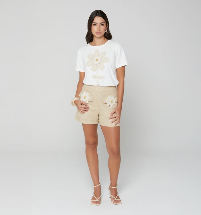 Short tiro alto bolsillos con flores