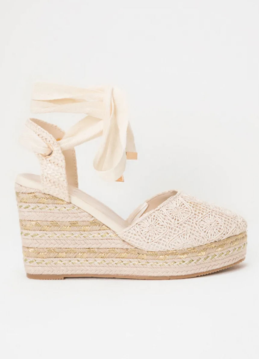 Foto de plataformas en yute en color beige y blanco de la última colección de STUDIO F